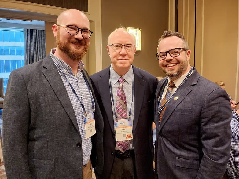 Dr. Kyle Hammonds with Dr. Eric Kramer (center) and a colleague at the NCA convention